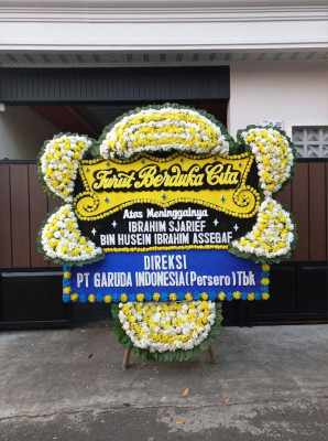 Papan Bunga Duka di Pelambuan